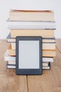 E-book reader on a stack of books Royalty Free Stock Photo