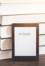 E-book reader on a stack of books Royalty Free Stock Photo