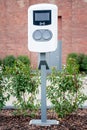e-car charging station, e-car charge point, electric vehicle supply equipment e-car public charging station Royalty Free Stock Photo