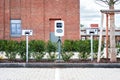 e-car charging station, electric vehicle supply equipment (EVSE) information sign electric car charge point, parking Royalty Free Stock Photo