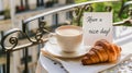 E-card: On a table on a balcony overlooking the city, there is a cup of steaming coffee, AI generated