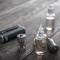 E-cigarettes with lots of different re-fill bottles Royalty Free Stock Photo