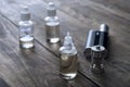 E-cigarettes with lots of different re-fill bottles Royalty Free Stock Photo