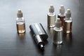 E-cigarettes with lots of different re-fill bottles Royalty Free Stock Photo