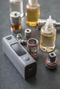 E-cigarettes with lots of different re-fill bottles Royalty Free Stock Photo