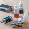 E-cigarettes with lots of different re-fill bottles Royalty Free Stock Photo