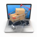 E-commerce. Shopping cart on laptop. Royalty Free Stock Photo