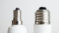 E14 and E27 light bulb screw fitting side by side Royalty Free Stock Photo