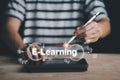 E-Learning concept, Man hand typing tablet and smartpen with webinar online, Education learn on internet. Learn Innovation with Royalty Free Stock Photo
