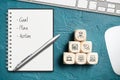 E-Learning concept and notepad with list GOAL, PLAN, ACTION Royalty Free Stock Photo