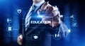 E-learning distance education concept. Businessman pressing button on screen Royalty Free Stock Photo