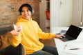 Japanese Boy Using Laptop Taking Sandwich From Mother At Home Royalty Free Stock Photo