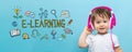 E-Learning with toddler boy with headphones Royalty Free Stock Photo