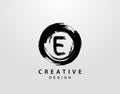 E Logo With Circle Splatter Element. VintageCircle Wave logo design template Royalty Free Stock Photo