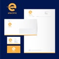 E logo and identity. Electric logo. Yellow logo on business card, letter, envelope. Royalty Free Stock Photo