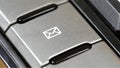 E-mail button, dedicated email client shortcut key with an envelope icon symbol on an office keyboard, sending e mails, messages Royalty Free Stock Photo