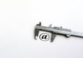 E-mail icon vith metal vernier on the white background Royalty Free Stock Photo