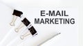 E-mail marketing written on a white page Royalty Free Stock Photo