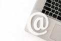 E-mail symbol on a laptop computer keyboard concept for email, communication or contact us Royalty Free Stock Photo