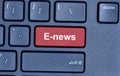 E-news word on computer keyboard