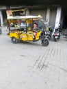 The e-rickshaw which runs in India stands in the vegetable market Ghaziabad.