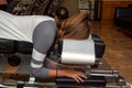 Side View of a Girl Laying on a Tilted Chiropractic Table Royalty Free Stock Photo