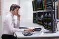 Stock Market Broker Analyzing Graphs On Computer Screens Royalty Free Stock Photo