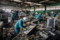 e-waste recycling facility, with workers sorting and dismantling old electronics Royalty Free Stock Photo