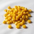 Each kernel is smooth and plump, with a few strands of corn silk intermingled Royalty Free Stock Photo