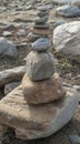 On each other stratified, stacked pebble stones, stones meditation