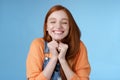Eager rejoicing thrilled pretty young redhead girl close eyes dreamy smiling receive great result scholarchip triumphing