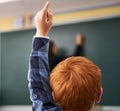 Always eager to answer. elementary school children in class.