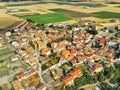 Eagle-eye shot of a town, trees, and agricultural fields - perfect for background