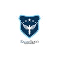 Eagle logo template design with a shield and stars. Vector illustration Royalty Free Stock Photo