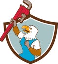 Eagle Plumber Raising Up Pipe Wrench Crest Cartoon