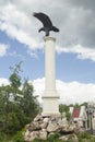 Eagle stone statue in the city park Royalty Free Stock Photo