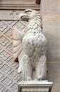 The eagle symbol of St. John the Evangelist, statue on the facade of Saint Augustine church in Paris