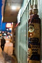 Eagle wooden totem pole / statue standing against a wall in downtown, Anchorage, Alaska. Taken at dawn during winter.