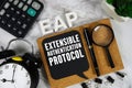 EAP Extensible Authentication Protocol text with Calculator, alarm clock and magnifying glass on marble background Royalty Free Stock Photo