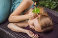 Ear candling being carried out on an attractive caucasian woman in a spa Royalty Free Stock Photo