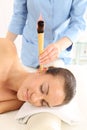 Ear candling, natural purifying treatment Royalty Free Stock Photo