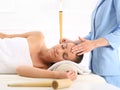 Ear candling, natural purifying treatment