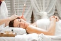 Ear Candling in Spa Royalty Free Stock Photo