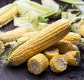 Ear of maize or corn on the dark wooden background Royalty Free Stock Photo