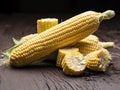 Ear of maize or corn on the dark wooden background
