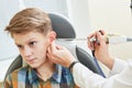 Ear, nose, throat examining. ENT doctor with a child patient and endoscope Royalty Free Stock Photo