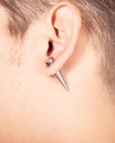 Ear piercing tunnel extension  close up Royalty Free Stock Photo