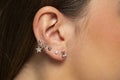 Ear piercings photos.Helix piercing.Ear rings