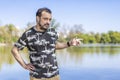 Earded mature man at a lake Royalty Free Stock Photo