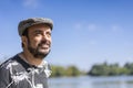 Earded mature man at a lake Royalty Free Stock Photo